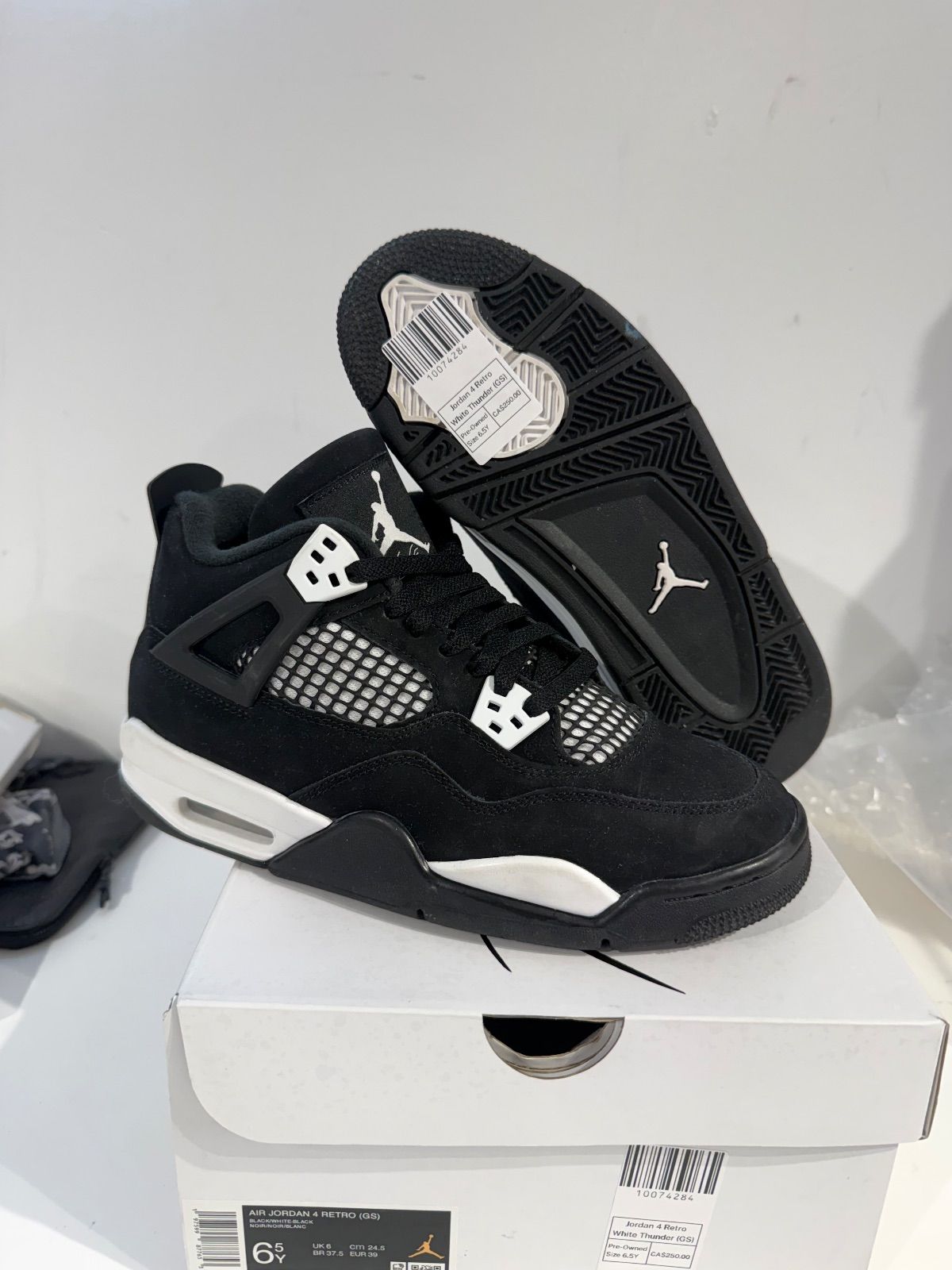Jordan 4 Retro White Thunder (GS) - Pre-Owned Size 6.5Y