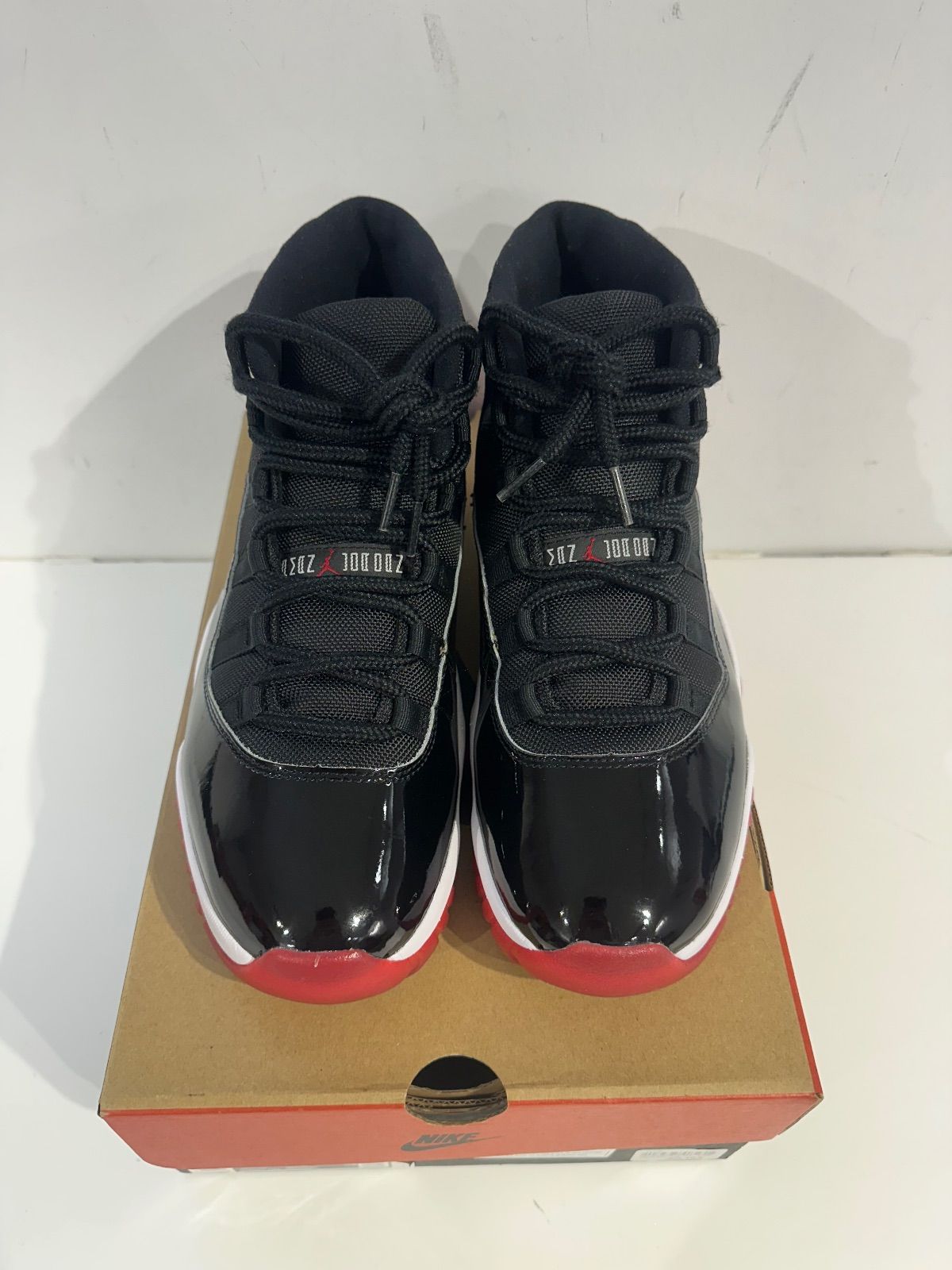 Jordan 11 Retro Playoffs Bred (2019) - Pre-Owned Size 10.5