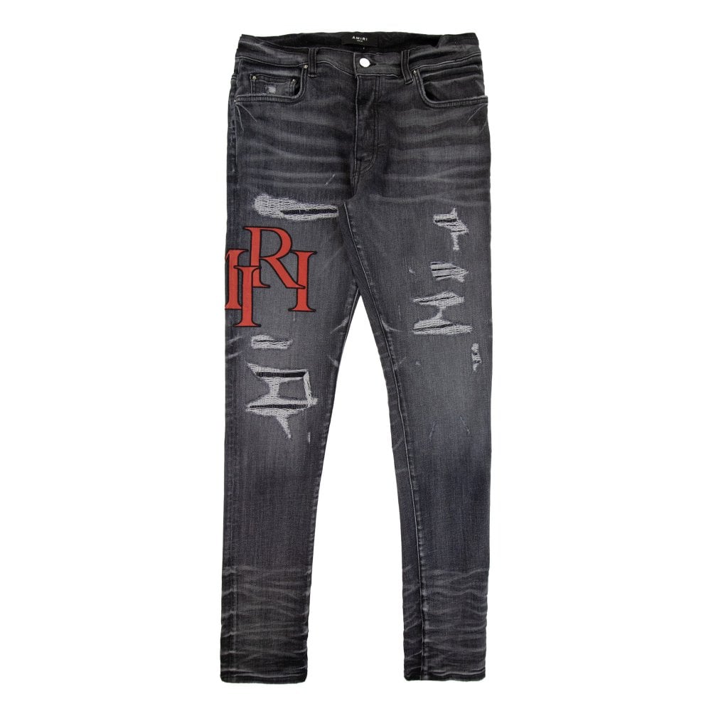 Amiri Staggered Logo Distressed Skinny Jeans