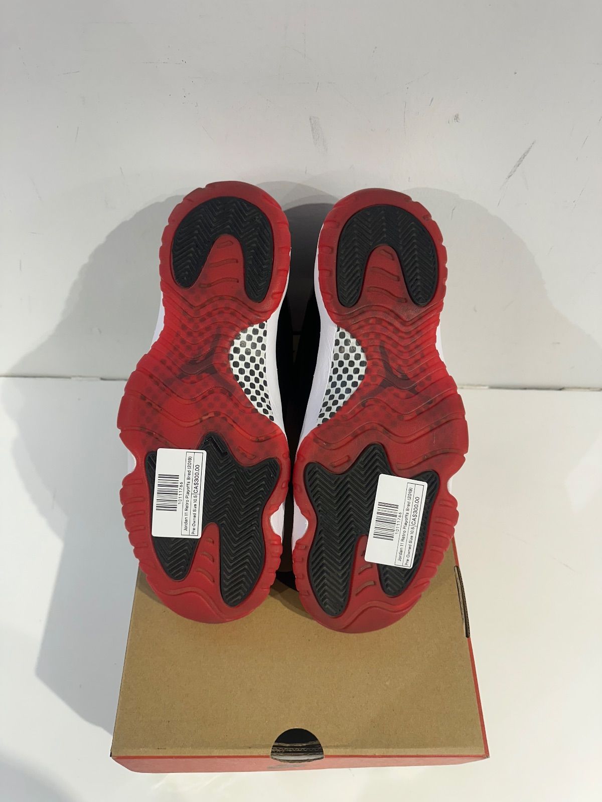 Jordan 11 Retro Playoffs Bred (2019) - Pre-Owned Size 10.5