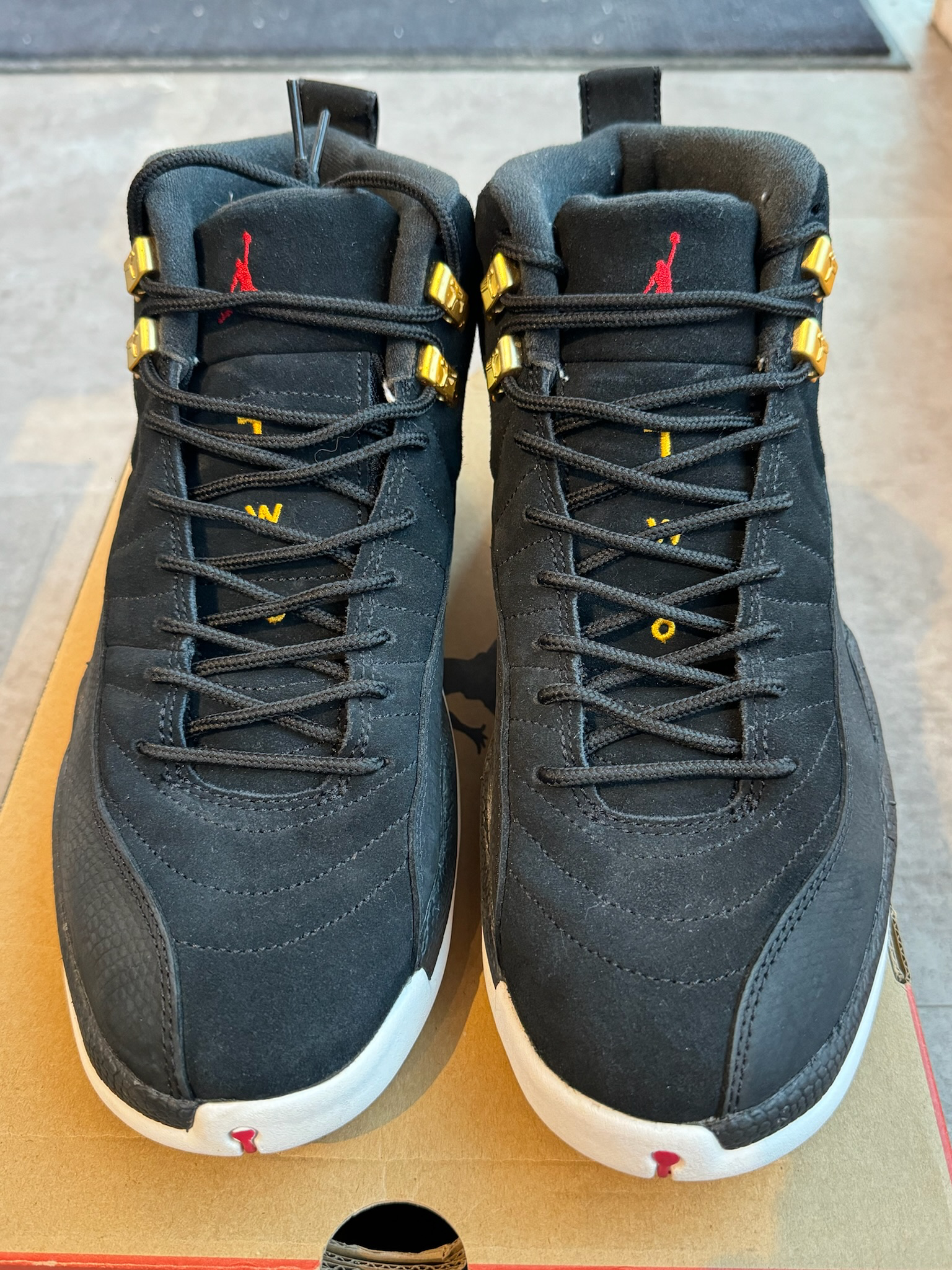 Jordan 12 Retro Reverse Taxi (Preowned Size 9.5)